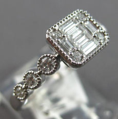 .41CT DIAMOND 14KT WHITE GOLD 3D ROUND & BAGUETTE INVISIBLE FILIGREE LOVE RING