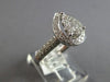 .70CT DIAMOND 18KT WHITE GOLD 3D CLASSIC ROUND CLUSTER PEAR SHAPE HALO LOVE RING