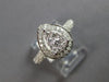 .70CT DIAMOND 18KT WHITE GOLD 3D CLASSIC ROUND CLUSTER PEAR SHAPE HALO LOVE RING