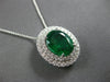 LARGE 4.03CT DIAMOND & AAA EMERALD 18KT WHITE GOLD OVAL & ROUND FLOATING PENDANT