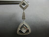 LARGE .96CT DIAMOND 18KT WHITE GOLD ROUND & PRINCESS TRIANGULAR HANGING EARRINGS