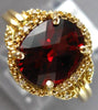 ESTATE 2.64CT DIAMOND & AAA GARNET 14KT YELLOW GOLD OVAL & ROUND LOVE KNOT RING