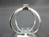 ESTATE LARGE .63CT DIAMOND 14KT WHITE GOLD ROUND HALO CRISS CROSS INFINITY RING
