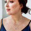 .38CT WHITE & BLACK DIAMOND 14KT WHITE GOLD CIRCULAR INFINITY FLOATING PENDANT