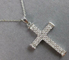 .45CT DIAMOND 14KT WHITE GOLD 3D ROUND & BAGUETTE 3 ROW CROSS FLOATING PENDANT