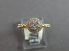 ESTATE .13CT DIAMOND 14KT WHITE GOLD 3D ROUND CLUSTER INVISIBLE HALO FUN RING