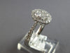 .82CT DIAMOND 18KT WHITE GOLD 3D CLASSIC ROUND CLUSTER HALO OVAL FRIENDSHIP RING