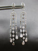 LONG 1.25CT DIAMOND 14KT WHITE GOLD ROUND & BAGUETTE HORSESHOE HANGING EARRINGS