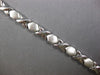 ESTATE WIDE 14KT WHITE GOLD 3D CLASSIC MATTE & SHINY XO LOVE BRACELET