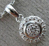 ESTATE SMALL .08CT DIAMOND 14KT WHITE GOLD 3D FILIGREE ROUND FLOATING PENDANT