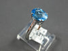 1.57CT DIAMOND & AAA BLUE TOPAZ 18KT WHITE GOLD OVAL & ROUND FILIGREE LOVE RING