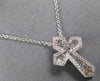 SMALL .52CT DIAMOND 14KT WHITE GOLD 3D ROUND & BAGUETTE CROSS FLOATING PENDANT