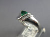 .43CT DIAMOND & AAA EMERALD 14K WHITE GOLD TRILLION & ROUND CRISS CROSS FUN RING