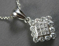 .75CT DIAMOND 14KT WHITE GOLD ROUND & PRINCESS INVISIBLE SQUARE FLOATING PENDANT