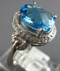 3.53CT DIAMOND & AAA BLUE TOPAZ 14KT WHITE GOLD OVAL & ROUND HALO LOVE KNOT RING