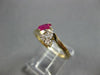 .45CT DIAMOND & AAA RUBY 14KT YELLOW GOLD OVAL & ROUND CRISS CROSS RING #27660