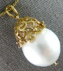 LARGE .10CT DIAMOND & AAA SOUTH SEA PEARL 18KT YELLOW GOLD MULTI FLOWER PENDANT