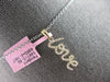 ESTATE .16CT DIAMOND 14KT YELLOW GOLD 3D CLASSIC SCRIPT LOVE FLOATING PENDANT