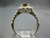WIDE .55CT DIAMOND 18KT WHITE GOLD BEZEL ROUND HALO SEMI MOUNT ENGAGEMENT RING