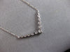 .59CT DIAMOND 14KT WHITE GOLD 3D GRADUATING V SHAPE SHARED PRONG LOVE NECKLACE