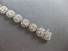 WIDE & LONG 1.26CT DIAMOND 14KT WHITE GOLD CLASSIC MULTI FLOWER TENNIS BRACELET