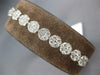 1.53CT DIAMOND 18KT WHITE GOLD INVISIBLE FLOWER ADJUSTABLE LOVE TENNIS BRACELET