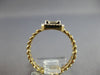 .22CT DIAMOND 14KT YELLOW GOLD ROUND & BAGUETTE INVISIBLE SQUARE LOVE KNOT RING