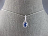 .91CT DIAMOND & AAA CEYLON SAPPHIRE 14KT WHITE GOLD OVAL HALO FLOATING PENDANT