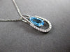 .77CT DIAMOND & AAA BLUE TOPAZ 14KT WHITE GOLD PEAR SHAPE & ROUND LUCKY PENDANT