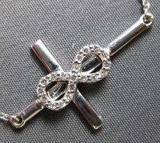 ESTATE .13CT DIAMOND 14KT WHITE GOLD 3D CLASSIC INFINITY CROSS FUN NECKLACE