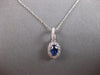 .91CT DIAMOND & AAA CEYLON SAPPHIRE 14KT WHITE GOLD OVAL HALO FLOATING PENDANT