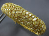 EXTRA LARGE GIA 47.4CT FANCY YELLOW DIAMOND 18K YELLOW GOLD CUFF TENNIS BRACELET