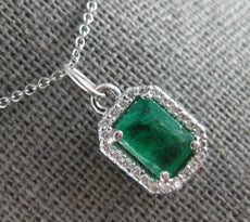 1.25CT DIAMOND & AAA EMERALD 14KT WHITE GOLD ROUND & SQUARE HALO OCTAGON PENDANT