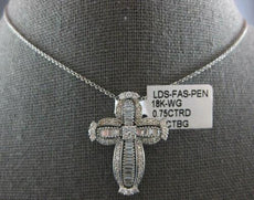 1.26CT DIAMOND 18KT WHITE GOLD ROUND & BAGUETTE FILIGREE CROSS FLOATING PENDANT