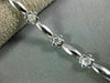 ESTATE .20CT DIAMOND 14KT WHITE GOLD 3D FLOWER BY THE YARD DAISY TENNIS BRACELET