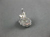 ESTATE .25CT DIAMOND 14KT WHITE GOLD 3D BEZEL FLOWER STUD EARRINGS