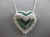 ESTATE .76CT DIAMOND & AAA EMERALD 14KT WHITE GOLD DOUBLE HEART FLOATING PENDANT