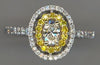 .77CT WHITE & FANCY YELLOW DIAMOND 18KT WHITE GOLD OVAL & ROUND ENGAGEMENT RING