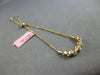 .34CT DIAMOND 14KT YELLOW GOLD 7 STONE GRADUATING BEZEL ADJUSTABLE LOVE BRACELET