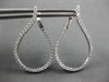 ESTATE LARGE 1.25CT DIAMOND 18KT WHITE GOLD TEAR DROP SIDEWAYS HANGING EARRINGS