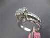 1.37CT DIAMOND 18KT WHITE GOLD ROUND BAGUETTE & PRINCESS CLUSTER ENGAGEMENT RING