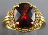 ESTATE 2.64CT DIAMOND & AAA GARNET 14KT YELLOW GOLD OVAL & ROUND LOVE KNOT RING