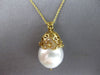 LARGE .10CT DIAMOND & AAA SOUTH SEA PEARL 18KT YELLOW GOLD MULTI FLOWER PENDANT