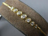 .34CT DIAMOND 18KT YELLOW GOLD 3D BEZEL 7 STONE GRADUATING LOVE TENNIS BRACELET