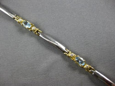 1.37CT DIAMOND & AAA AQUAMARINE 14KT 2 TONE GOLD OVAL & ROUND 3 STONE BRACELET