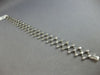ESTATE .52CT DIAMOND 14K WHITE GOLD BEZEL ETOILE CRISS CROSS FUN TENNIS BRACELET