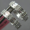 .65CT DIAMOND 14KT WHITE GOLD 3D ROUND & BAGUETTE 2 ROW HUGGIE HANGING EARRINGS