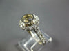 WIDE .55CT DIAMOND 18KT WHITE GOLD BEZEL ROUND HALO SEMI MOUNT ENGAGEMENT RING