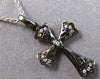 ESTATE SMALL .04CT DIAMOND 14KT BLACK GOLD 3D CROSS FLOATING PENDANT