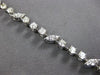 3.15CT DIAMOND 14KT WHITE GOLD 3D ROUND MULTI LEAF BY THE YARD TENNIS BRACELET